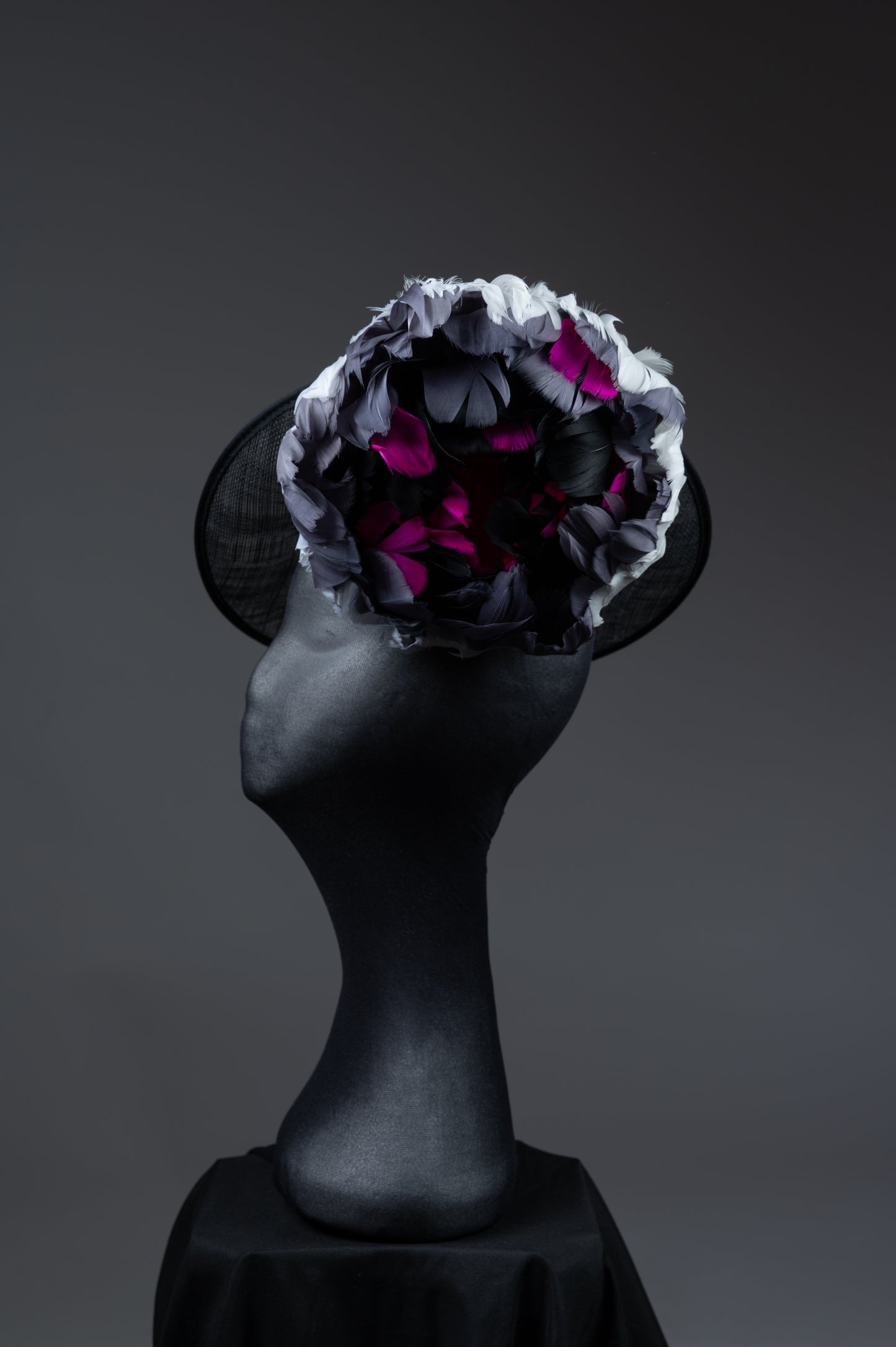 Handmade Black Saucer Fascinator with handmade feather flower.