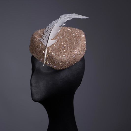 Triangular Sequin gold tones Fascinator.