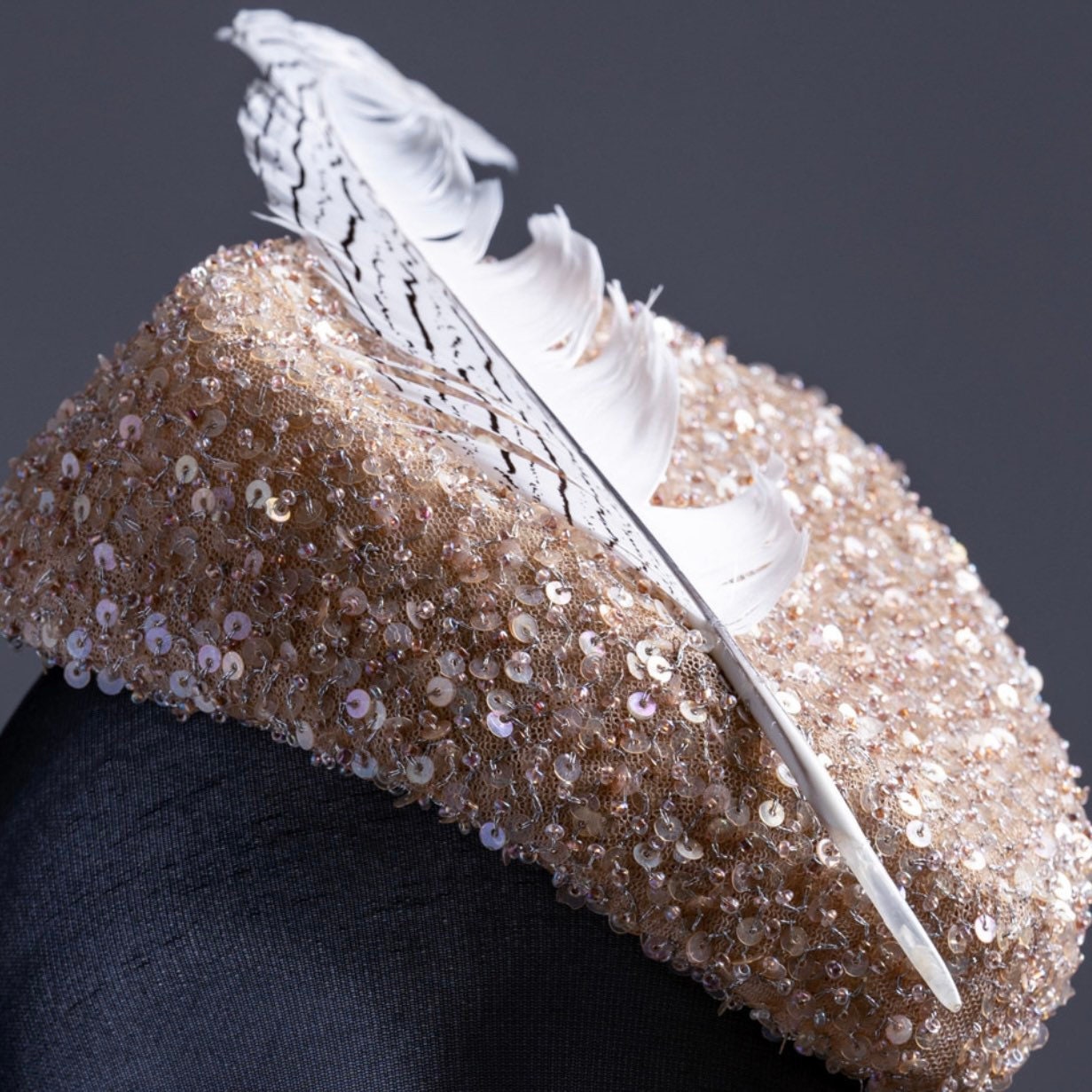 Triangular  Sequin gold tones Fascinator.