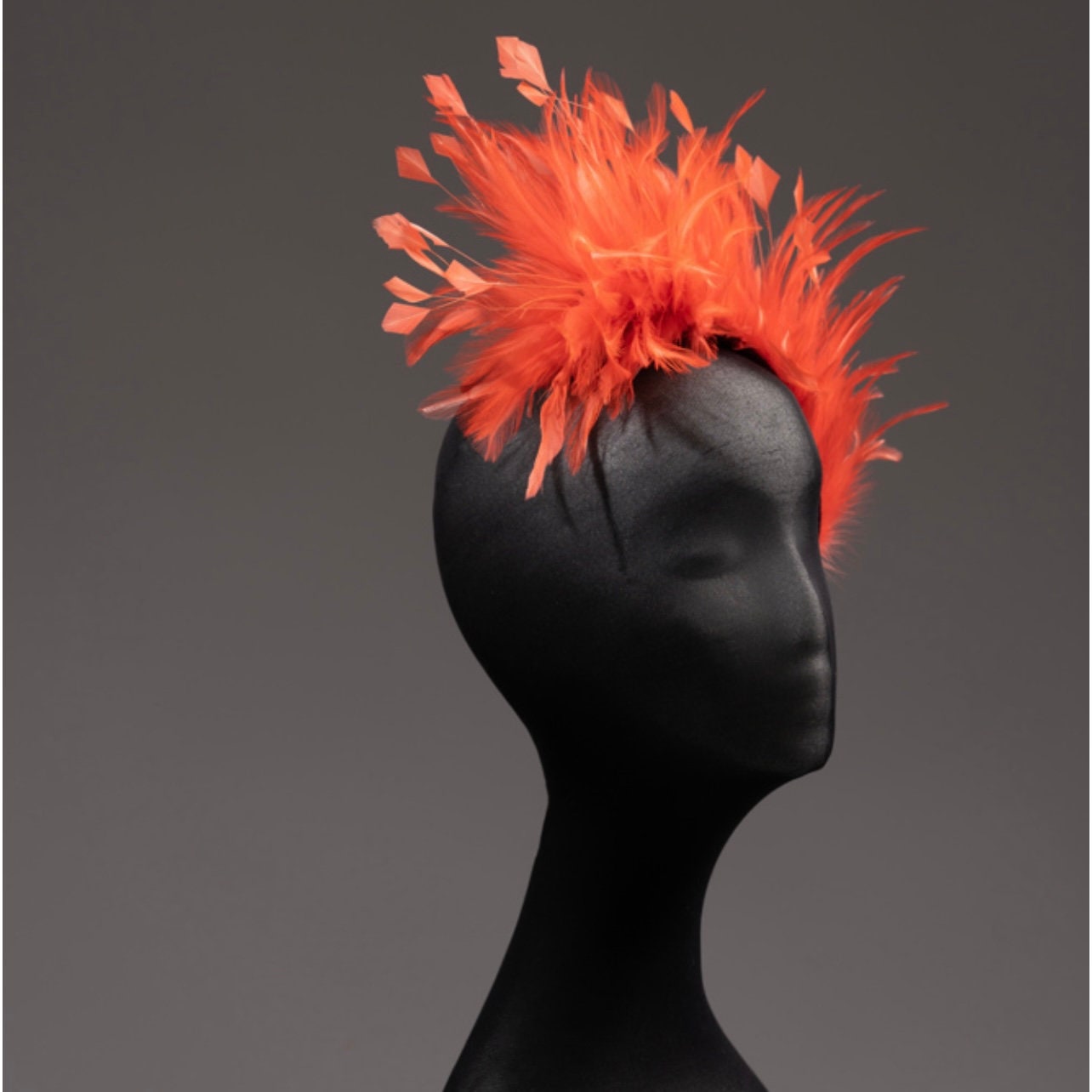Orange feather brush Fascinator headband