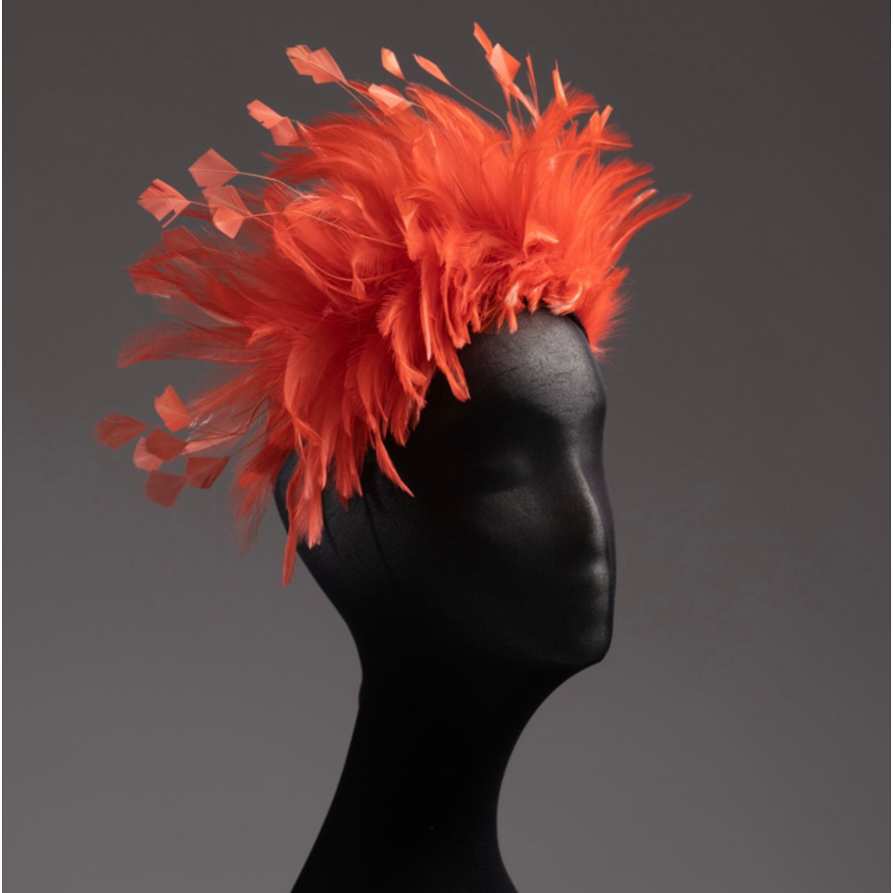 Orange feather brush Fascinator headband