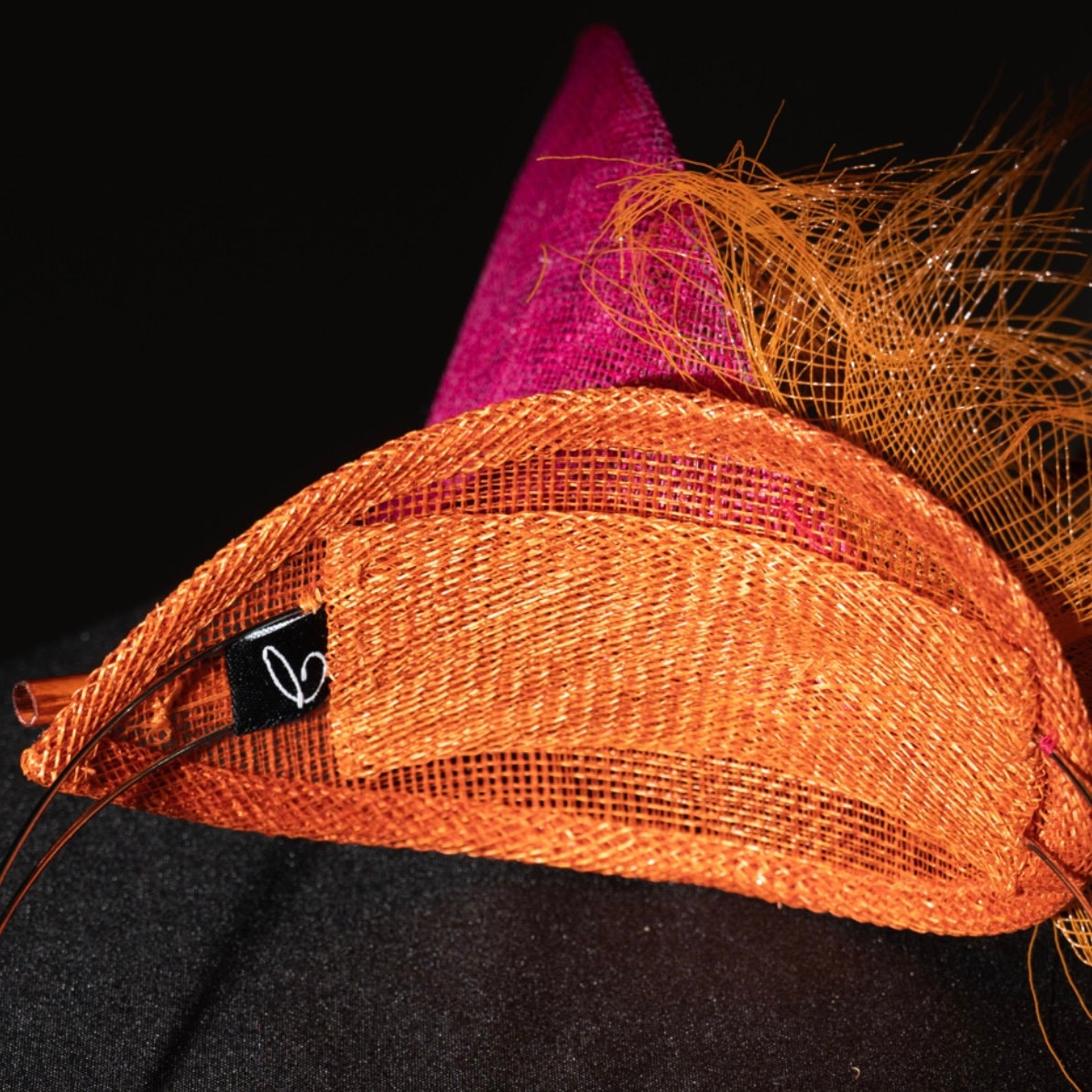 Dancing Flame Fascinator. Pink and Orange.