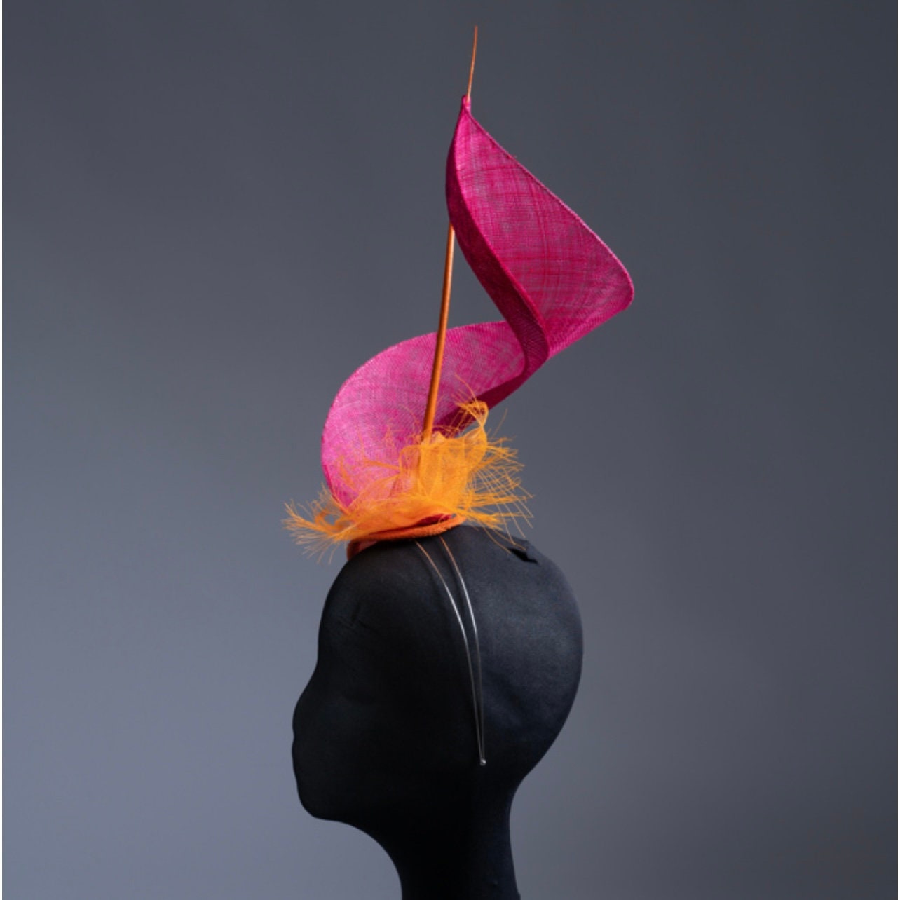Dancing Flame Fascinator. Pink and Orange.